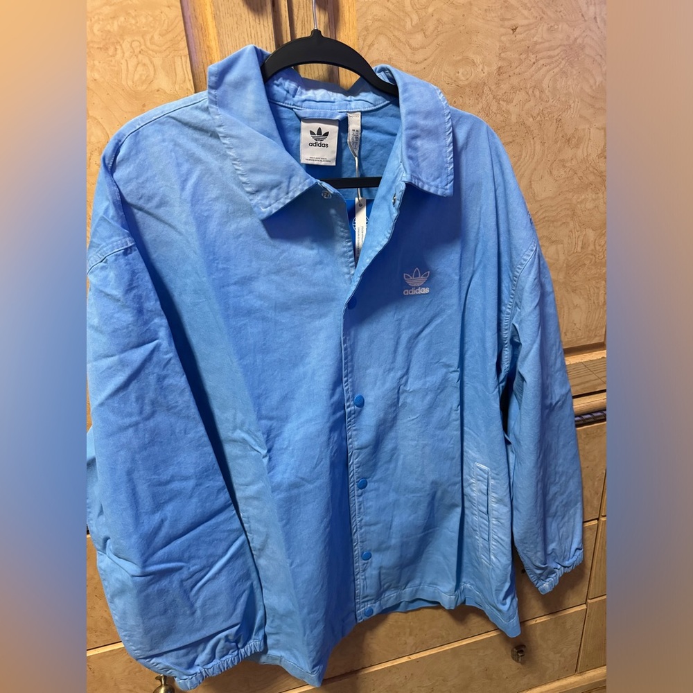 Adidas Blue Coach Jacket Various sizes from small to Xlarge.